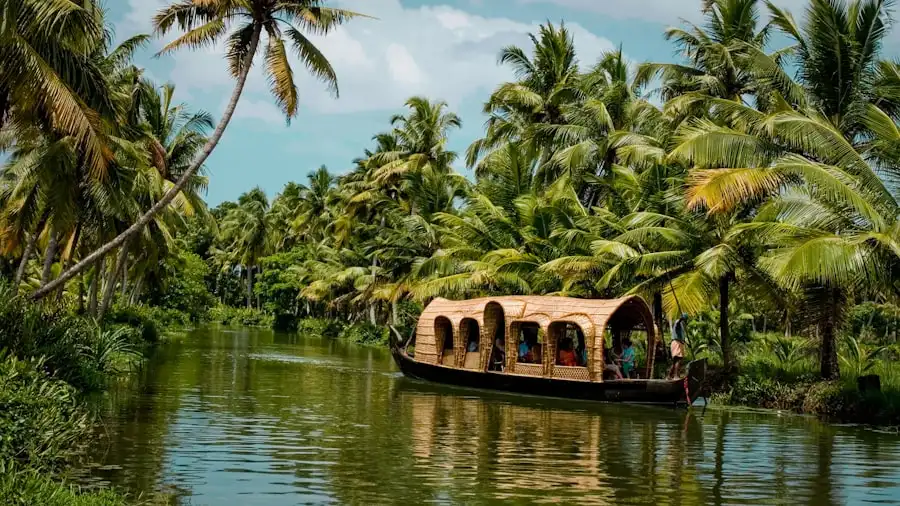 Houseboat on Alleppey backwaters at sunset — Kerala honeymoon package